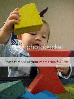 toddler with blocks