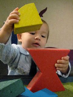 toddler with blocks